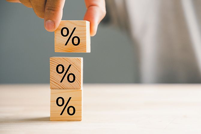 FDIC Interest Rate Restrictions; Wooden blocks with percentage symbols stacked