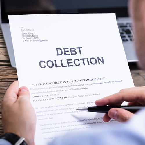 Person holding Debt Collection notice