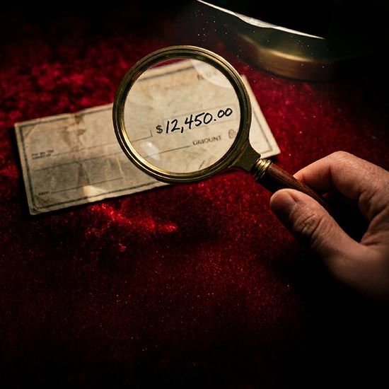 Check with magnifying glass